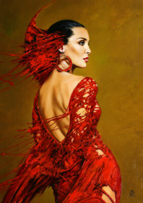 Ciemnowłosa piękność w czerwonej sukni i pięknymi czerwonymi kolczykami jakby wyjęta z opery Georges'a Bizeta.